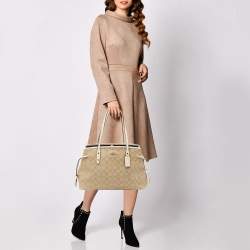 Pre Owned Coach Cream/Beige Signature Coated Canvas and Leather Drawstring Carryall Satchel