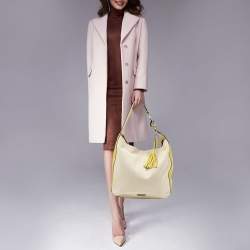 Pre Owned Coach Lime Green/Beige Canvas and Leather Avery Hobo