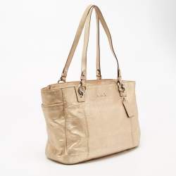 Pre Owned Coach Gold Signature Embossed Leather East West Gallery Tote