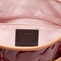 مملوكة مسبقًا حقيبة يد توتس كوتش بيتون جلد لامع منقوش بالشعار أحمر/بيج