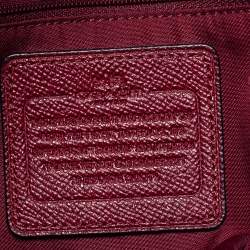 مملوكة مسبقًا حقيبة يد توتس كوتش شارلي كاريال جلد عنابي قفل دوار