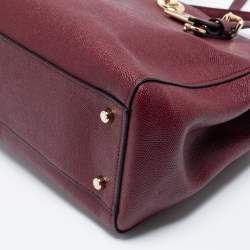 مملوكة مسبقًا حقيبة يد توتس كوتش شارلي كاريال جلد عنابي قفل دوار