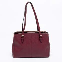 مملوكة مسبقًا حقيبة يد توتس كوتش شارلي كاريال جلد عنابي قفل دوار