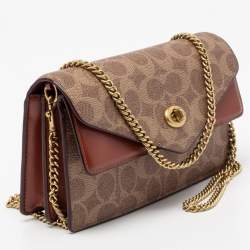 Pre Owned Coach Beige/Tan Signature Coated Canvas and Leather Aster Crossbody Bag