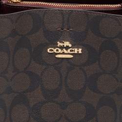 Pre Owned Coach Brown/Red Signature Coated Canvas and Leather Small Town Bucket Bag