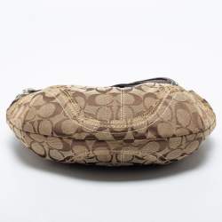 Pre Owned Coach Beige/Brown Signature Canvas and Leather Soho Hobo