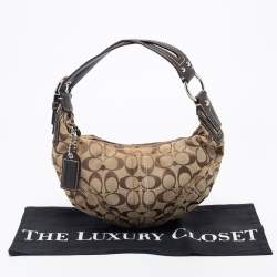 Pre Owned Coach Beige/Brown Signature Canvas and Leather Soho Hobo