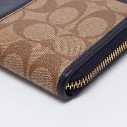 Pre Owned Coach Beige/Blue Signature Coated Canvas and Leather Accordion Zip Around Wallet