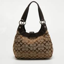 Pre Owned Coach Beige/Brown Signature Canvas and Leather Soho Lynn Hobo
