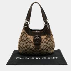 Pre Owned Coach Beige/Brown Signature Canvas and Leather Soho Lynn Hobo