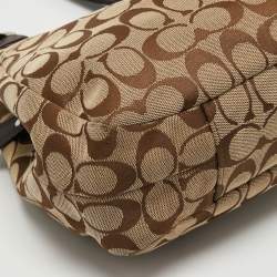 Pre Owned Coach Beige/Brown Signature Canvas and Leather Soho Lynn Hobo