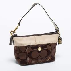 Pre Owned Coach Brown/Beige Signature Canvas Front Pocket Baguette Bag