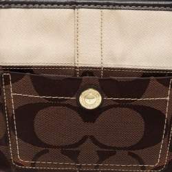 Pre Owned Coach Brown/Beige Signature Canvas Front Pocket Baguette Bag