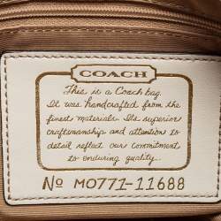 Pre Owned Coach Brown/Beige Signature Canvas Front Pocket Baguette Bag