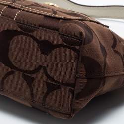 Pre Owned Coach Brown/Beige Signature Canvas Front Pocket Baguette Bag