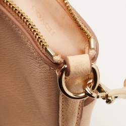 Pre Owned Coach Peach Leather North South Swingpack Crossbody Bag