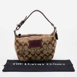 Pre Owned Coach Beige/Brown Signature Canvas and Leather Baguette
