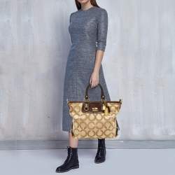 Pre Owned Coach Beige/Brown Op Art Canvas and Patent Leather Julianne Hobo  