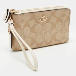 Pre Owned Coach Beige Signature Coated Canvas and Leather Double Zip Wristlet Pouch