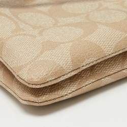 Pre Owned Coach Beige Signature Coated Canvas and Leather Double Zip Wristlet Pouch