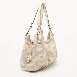 Pre Owned Coach White/Beige Op Art Canvas Madison Maggie Shoulder Bag