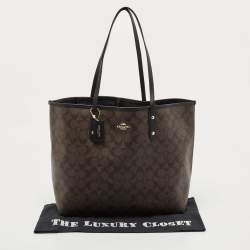 Pre Owned Coach Dark Brown Signature Coated Canvas and Leather City Tote