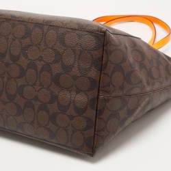 Pre Owned Coach Dark Brown/Neon Signature Coated Canvas and Leather Signature Zip Tote