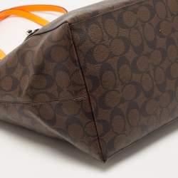 Pre Owned Coach Dark Brown/Neon Signature Coated Canvas and Leather Signature Zip Tote