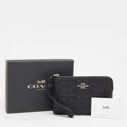 Pre Owned Coach Black Embossed Leather Wristlet Clutch