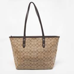 Pre Owned Coach Beige/Brown Signature Coated Canvas and Leather City Zip Tote