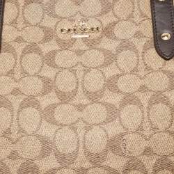 Pre Owned Coach Beige/Brown Signature Coated Canvas and Leather City Zip Tote