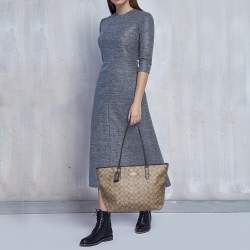 Pre Owned Coach Beige/Brown Signature Coated Canvas and Leather City Zip Tote