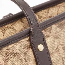 Pre Owned Coach Beige/Brown Signature Coated Canvas and Leather City Zip Tote