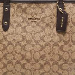 Pre Owned Coach Beige/Brown Signature Coated Canvas and Leather City Zip Tote
