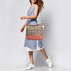 Pre Owned Coach Beige/Coral Orange Signature Canvas and Leather Park Hobo