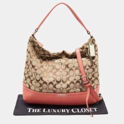 Pre Owned Coach Beige/Coral Orange Signature Canvas and Leather Park Hobo