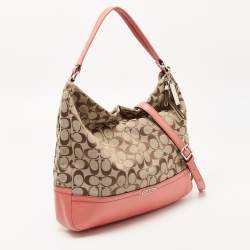 Pre Owned Coach Beige/Coral Orange Signature Canvas and Leather Park Hobo