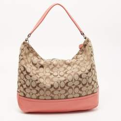 Pre Owned Coach Beige/Coral Orange Signature Canvas and Leather Park Hobo