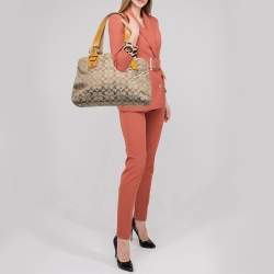 Coach Tan/Beige Canvas and Patent Leather Buckle Handle Tote