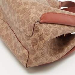 Pre Owned Coach Beige/Brown Signature Coated Canvas and Leather Hadley 21 Hobo