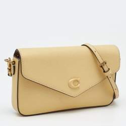Pre Owned Coach Yellow Leather Wyn Flap Crossbody Bag