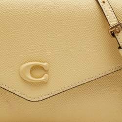 Pre Owned Coach Yellow Leather Wyn Flap Crossbody Bag