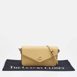 Pre Owned Coach Yellow Leather Wyn Flap Crossbody Bag
