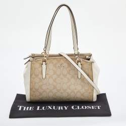 Pre Owned Coach Beige/Tan Signature Coated Canvas and Leather Christie Carryall Shoulder Bag