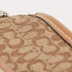 Pre Owned Coach Brown/Beige Signature Canvas and Leather Swingpack Crossbody Bag