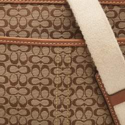 Pre Owned Coach Brown/Beige Signature Canvas and Leather Swingpack Crossbody Bag