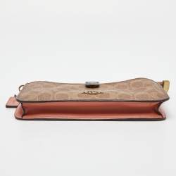 Pre Owned Coach Beige/Peach Signature Coated Canvas and Leather Noa Pop Up Crossbody Bag