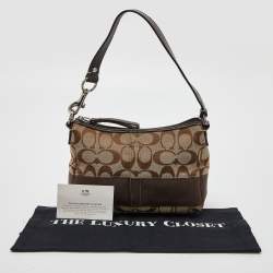 Pre Owned Coach Brown/Beige Signature Canvas and Leather Baguette Bag 