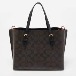 Pre Owned Coach Brown/Black Signature Coated Canvas Tatum Caryall Tote