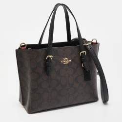 Pre Owned Coach Brown/Black Signature Coated Canvas Tatum Caryall Tote